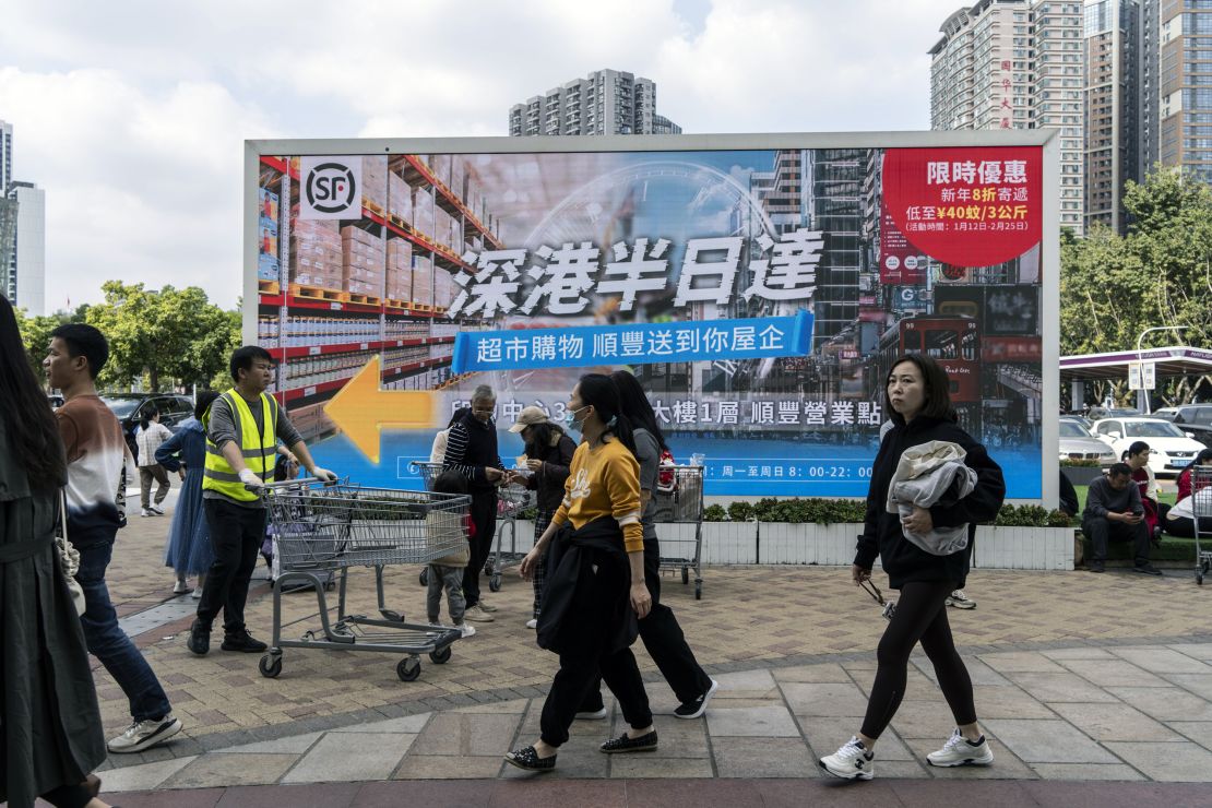 A billboard ad outside a Sam's Club store in Shenzhen appealing to Hong Kong customers by promoting its same-day delivery service