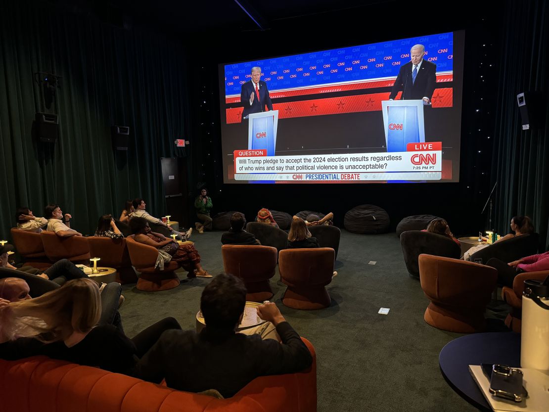 Patrons gather to watch the CNN presidential debate on June 27 at the Cinelounge movie theater in Tiburon, California.